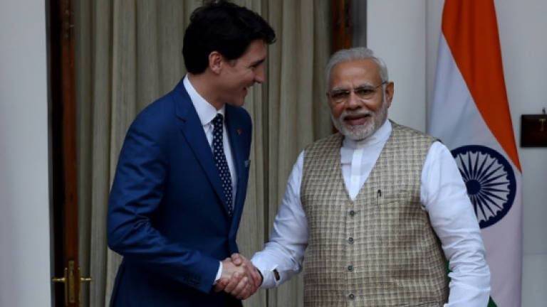 Modi talks tough on separatists after meeting Trudeau