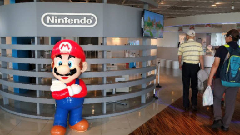 Nintendo shares jump on Super Mario app for iPhones