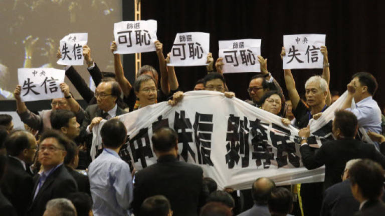 Hong Kong activists in fightback after China vote decision