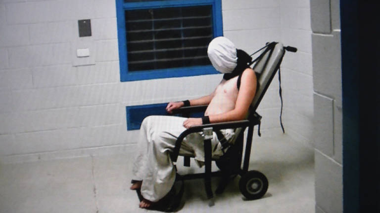 Australia probes youth detention abuse likened to Guantanamo