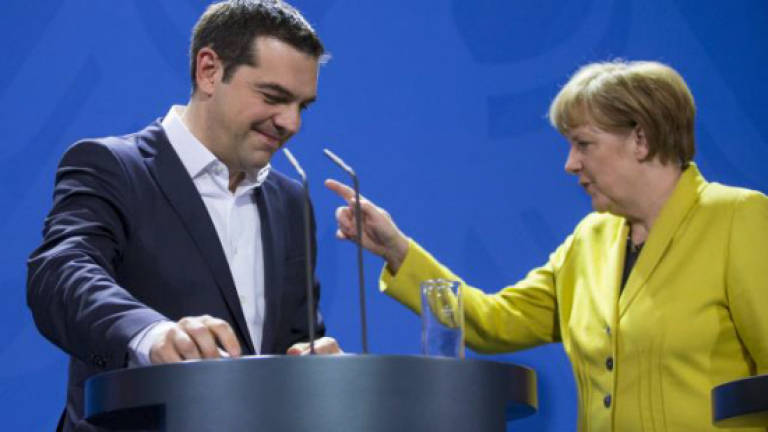 Cautious Merkel on verge of biggest risk with 'Grexit'