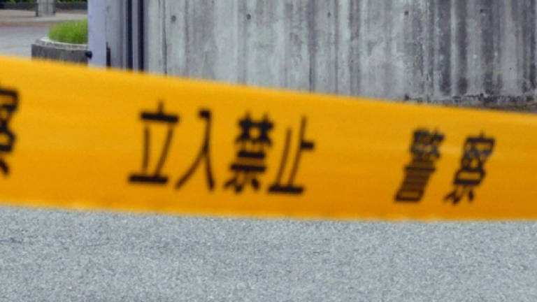 Mother in Japan questioned after 4 children found dead