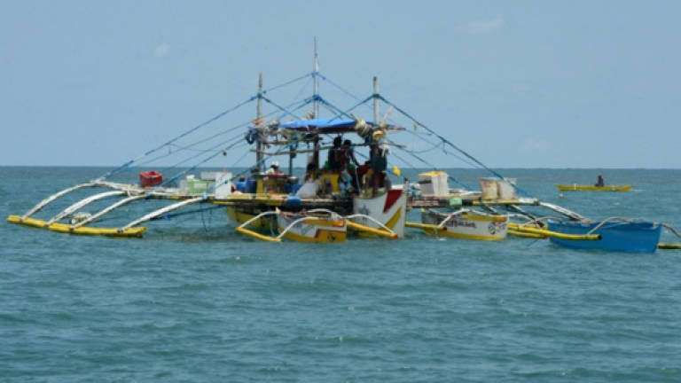 Philippine fishermen decry Duterte's disputed shoal ban