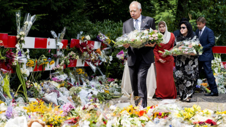 Najib, Rosmah observe a moment of silence at Hilversum