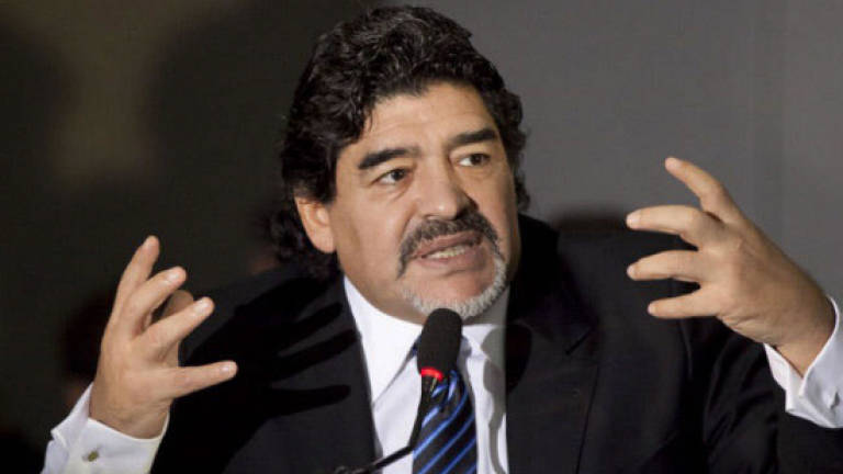 Footballer Maradona defends Venezuela president