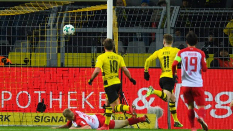 Reus strikes again as Dortmund held by Augsburg