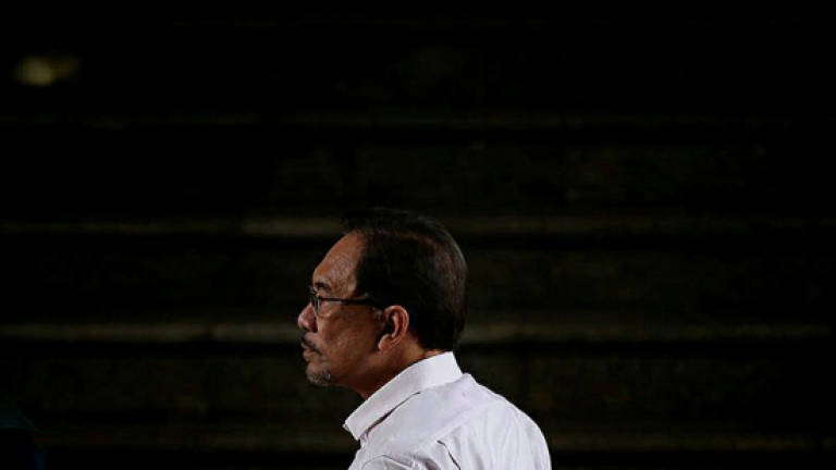 Judge recuses himself from hearing Anwar's suit against govt