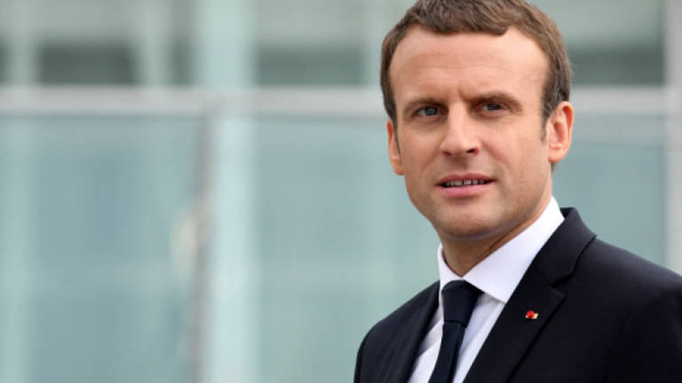Man charged for threatening to kill France's Macron