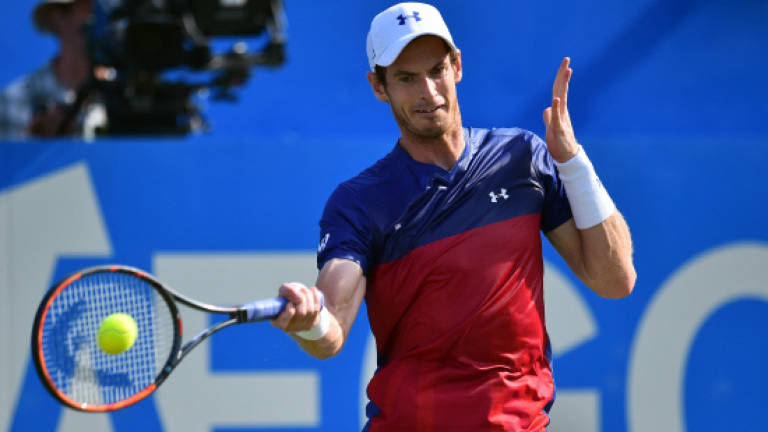 Murray stunned as seeds fall at Queen's