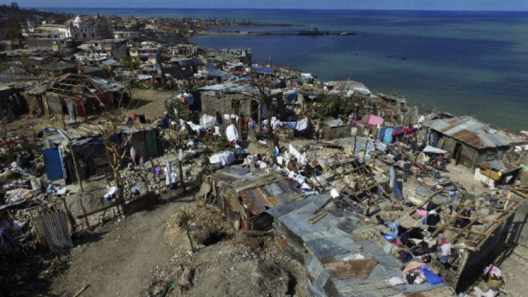 One dead, three injured in Haiti aid distribution chaos