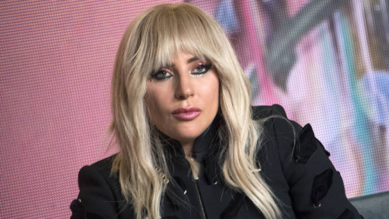 Pain-wracked Lady Gaga postpones Europe tour