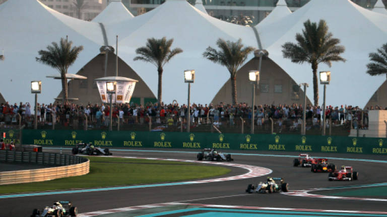 Rosberg foils Hamilton to claim maiden title