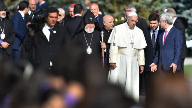 Pope visits Armenian genocide memorial