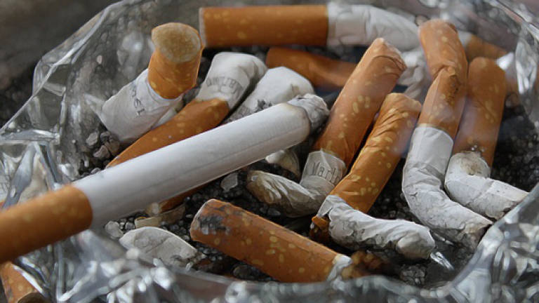 Up tobacco taxes in effort to counter smoking-related deaths: WHO