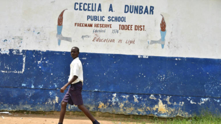 Liberia's controversial school reforms divide the nation a year on