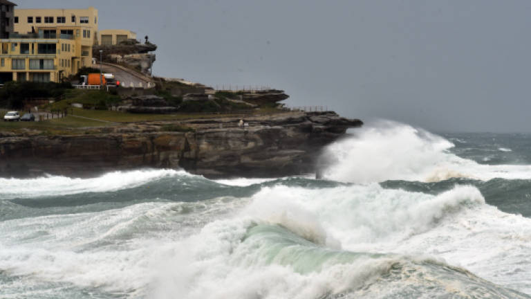 Three dead as wild weather lashes Australian state