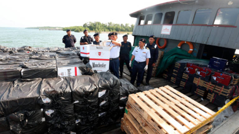 MMEA arrests nine, seizes RM2.5m of smuggled cigarettes, liquor (Updated)
