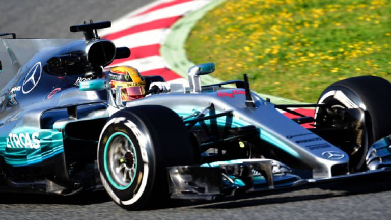 Hamilton's 'beast' pips Vettel in first-day testing
