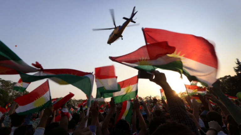 Iraq Kurds in historic independence vote in defiance of Baghdad
