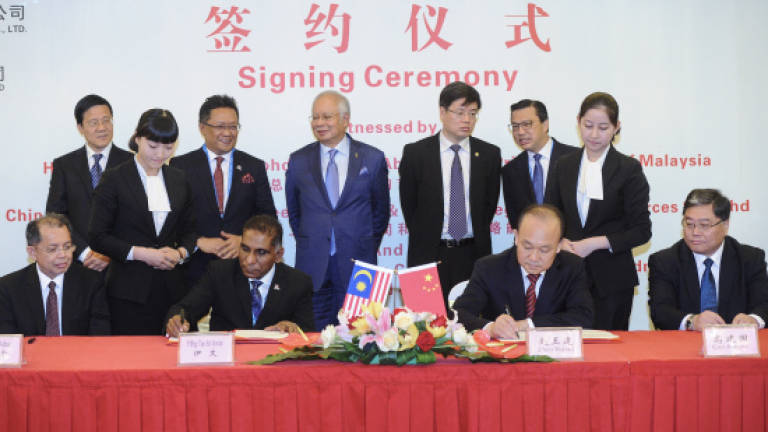 Chinese companies ink deals to complete RM55b ECRL, Pengerang projects