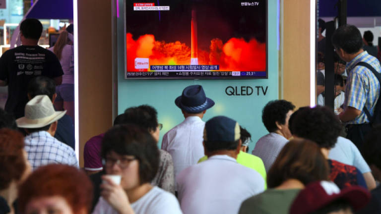 N. Korea test fires ICBM in fresh challenge to Trump