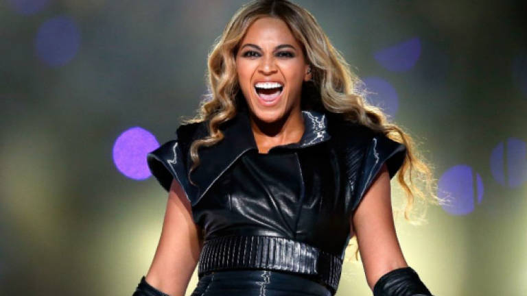 Beyonce, in surprise new track, takes on police abuse