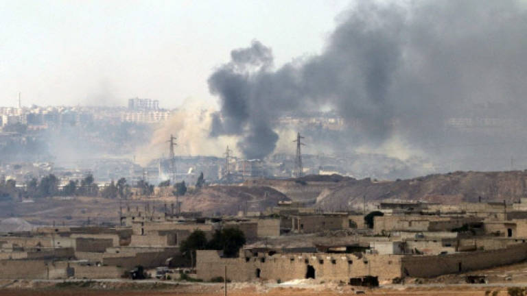 Air strikes kill 22 civilians in eastern Syria