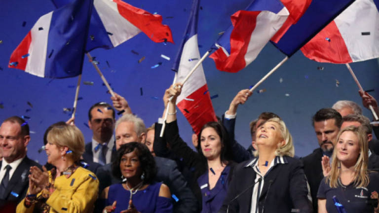France's Le Pen fights plagiarism charge, Macron camp frets