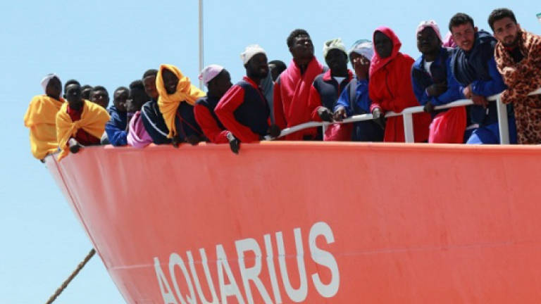 Italy urges other EU ports to welcome migrants