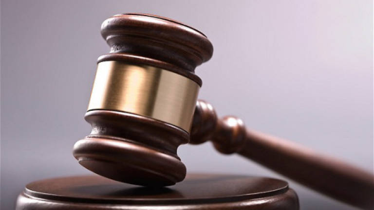 Customs dept employee claims trial to corruption charges