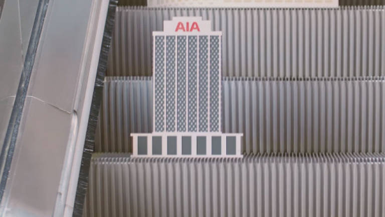 AIA Malaysia celebrates 70 years of history on an escalator in video by Leo Burnett