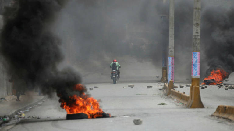 Violence erupts in Haiti over national budget