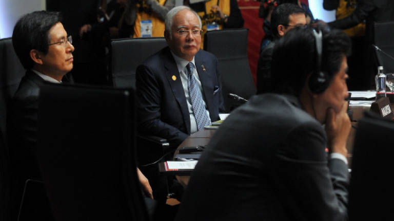 IMF supportive of Malaysia's currency move, ringgit movement out of control: Najib