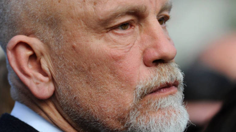 Malkovich a 'man of integrity' French court told in defamation case