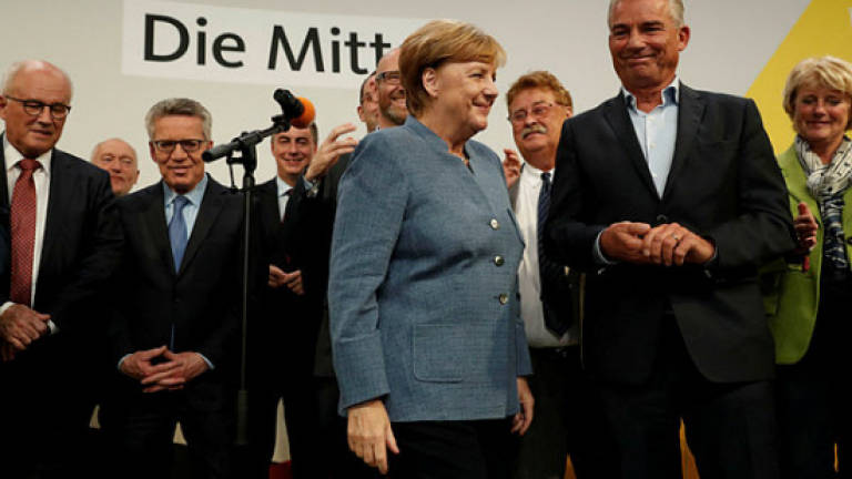 Merkel faces tricky coalition talks after 'nightmare victory'