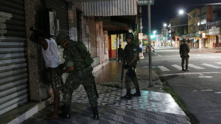 In Brazil's Rio state, 2017 cop death toll hits 100