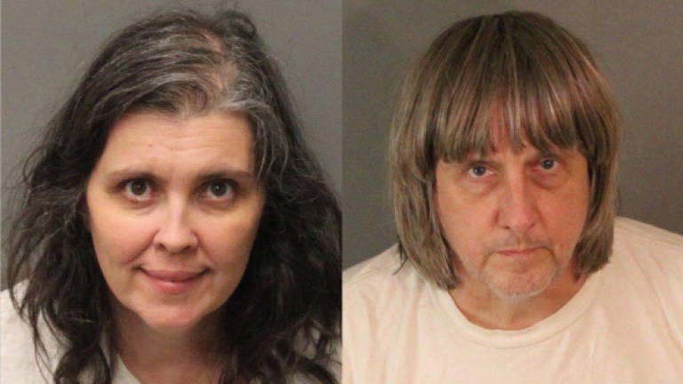 California couple who held 13 children captive due in court
