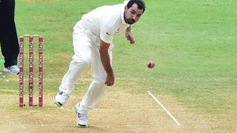 Shami named in India's delayed Trophy squad