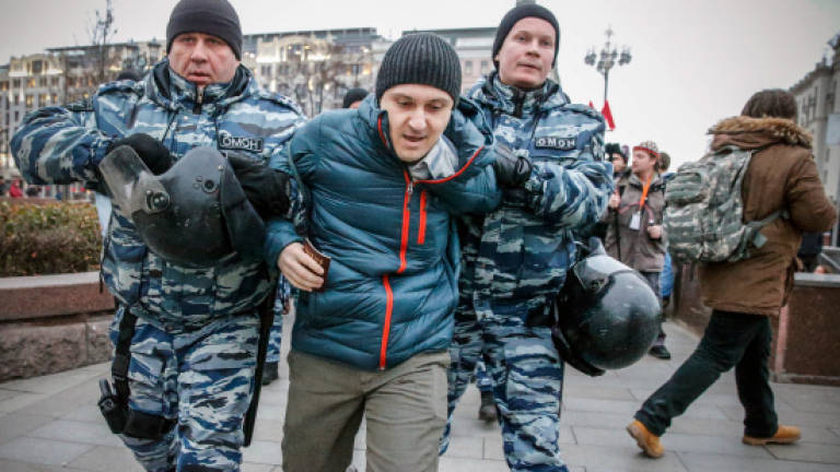 Russian police detain 380 at anti-Putin protest (Updated)