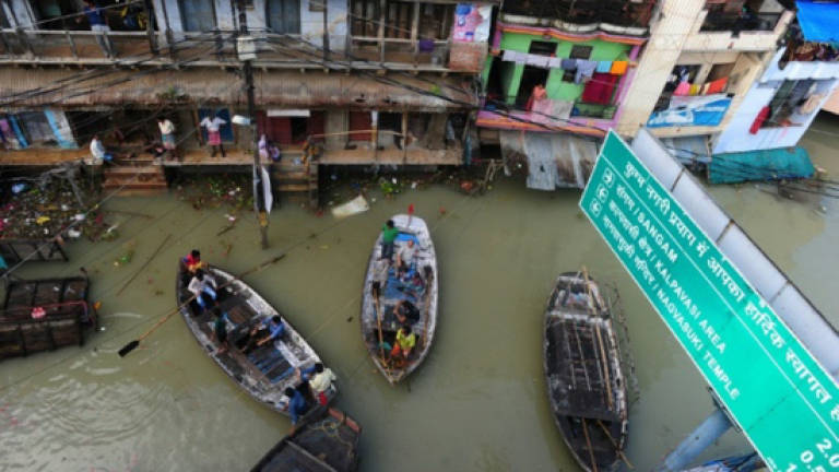 Flooding in Indian holy city halts cremations