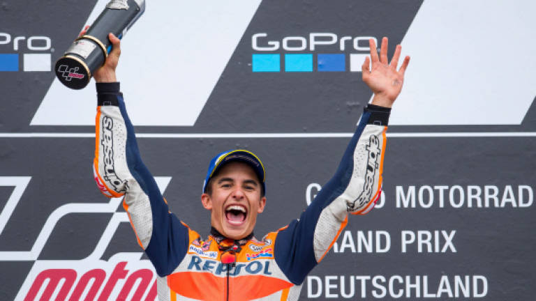 Marquez wins in Germany to claim overall lead
