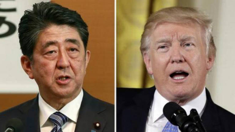 Trump, Japan's Abe deem N.Korea 'a grave and growing' threat