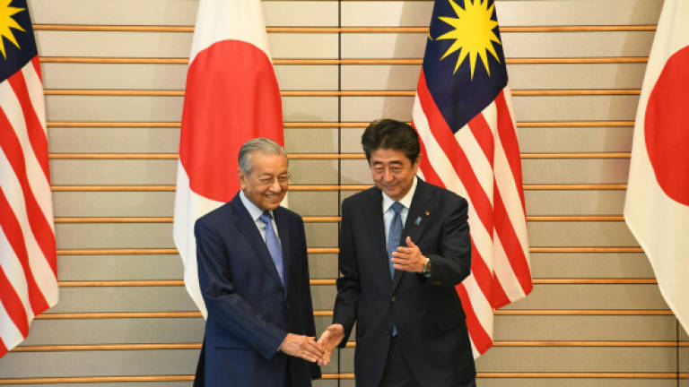 Dr M meets Abe in Tokyo