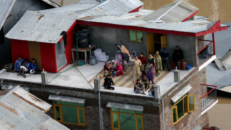 Floods hit a million in Pakistan, anger rises in Indian Kashmir
