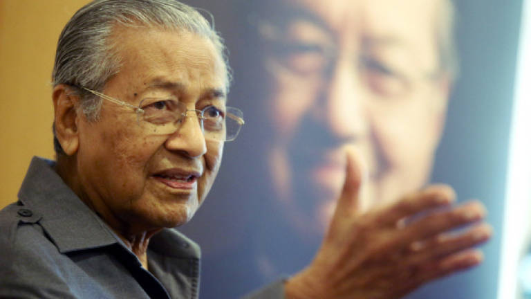 Dr M: Why are grads selling nasi lemak and driving Uber?