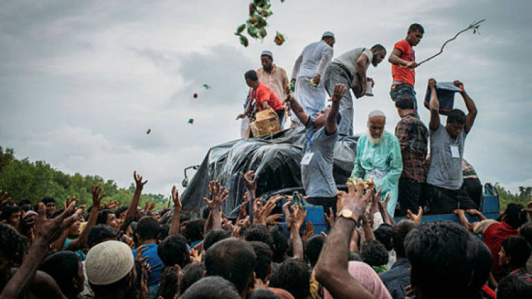 Bangladesh guards Buddhists amid Rohingya backlash fears