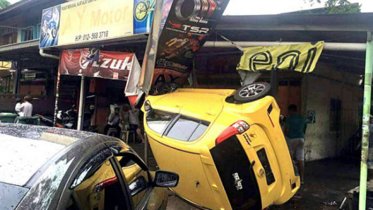 Senior citizen crashes car into petrol station