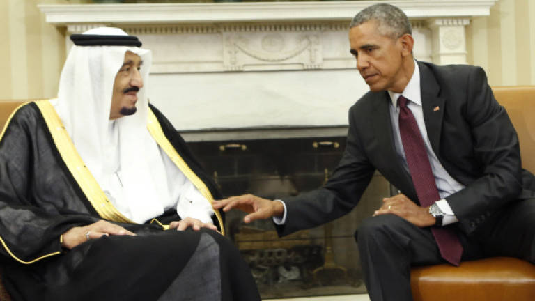 Obama and Saudi king stress warm ties at White House summit