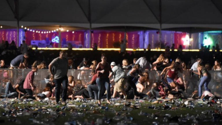 Gaga, Grande urge gun control amid artist shock at Vegas carnage
