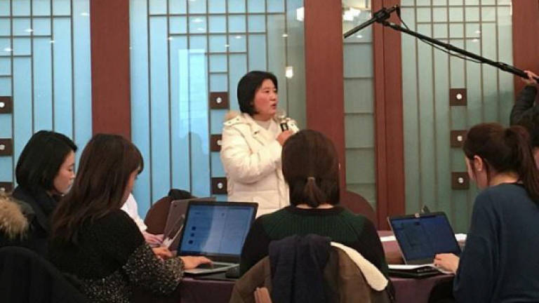 N. Korean defector pleads to return at UN event